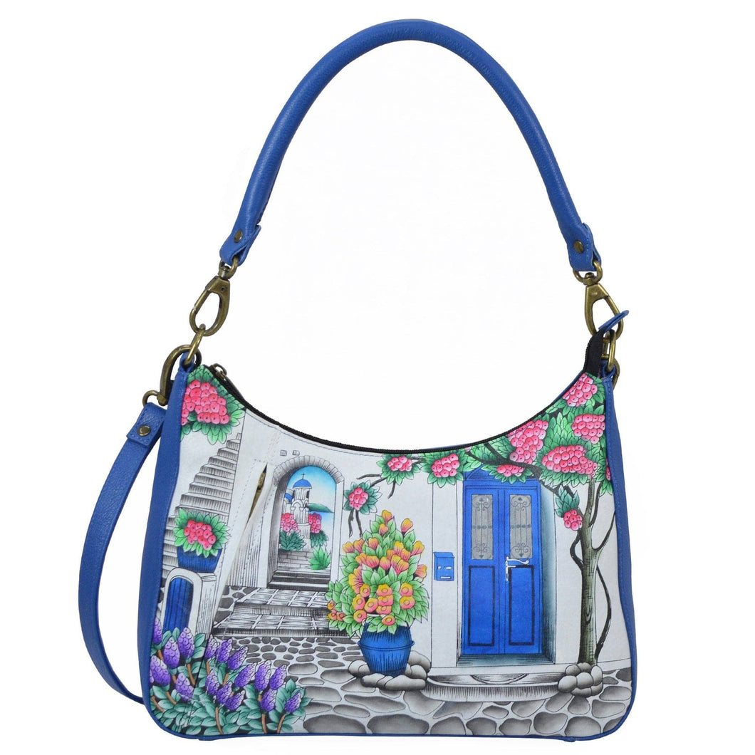 Anna by Anuschka style 8487, handpainted Large Top Zip Hobo. Magical Greece in Blue color. Featuring inside one zippered wall pocket, one open wall pocket, two multipurpose pockets with gusset and front vertical zippered pocket.